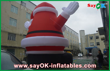Natale rosso il Babbo Natale di festa di altezza gonfiabile delle decorazioni 8m grande con il panno di Oxford