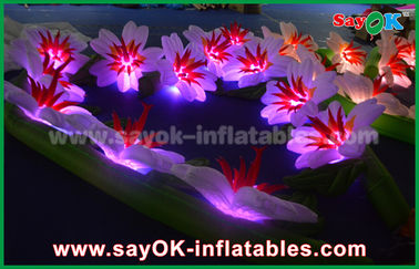 La decorazione d'accensione gonfiabile del partito ha condotto i fiori gonfiabili del panno di Oxford della catena di fiore con le luci del LED