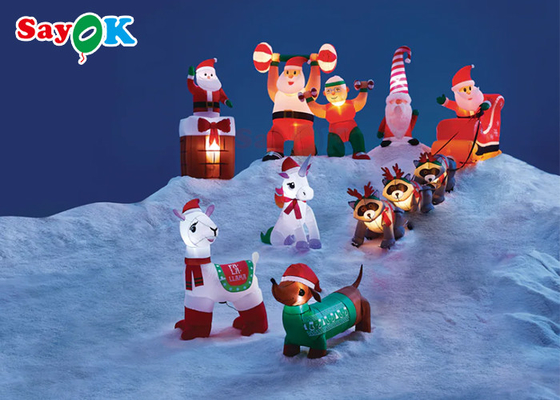 Le decorazioni gonfiabili di natale di Natale gigante tre procioni tirano Santa Claus To Give Gifts