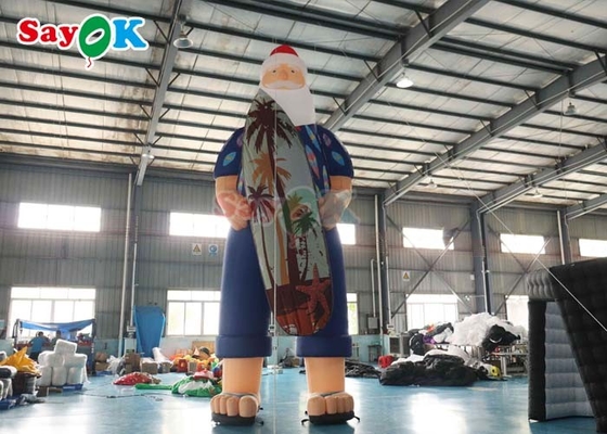 Modello di decorazione natalizia hawaiana Babbo Natale gonfiabile sulla spiaggia Dimensione 7.6m