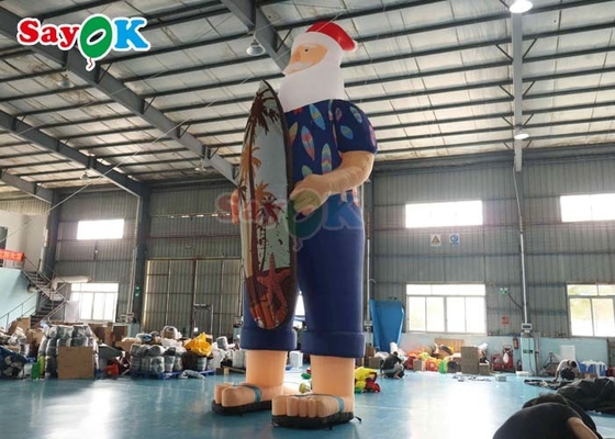 Modello di decorazione natalizia hawaiana Babbo Natale gonfiabile sulla spiaggia Dimensione 7.6m