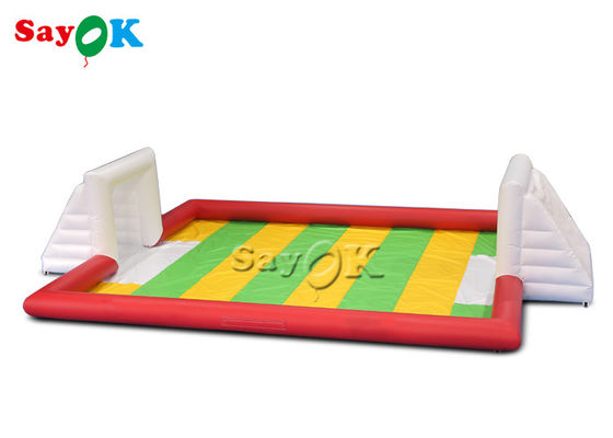 Campo di calcio gonfiabile rosso gonfiabile di esplosione di carnevale dei giochi di sport del PVC dei giochi di partito 10x7m